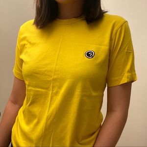 CDG yellow tee